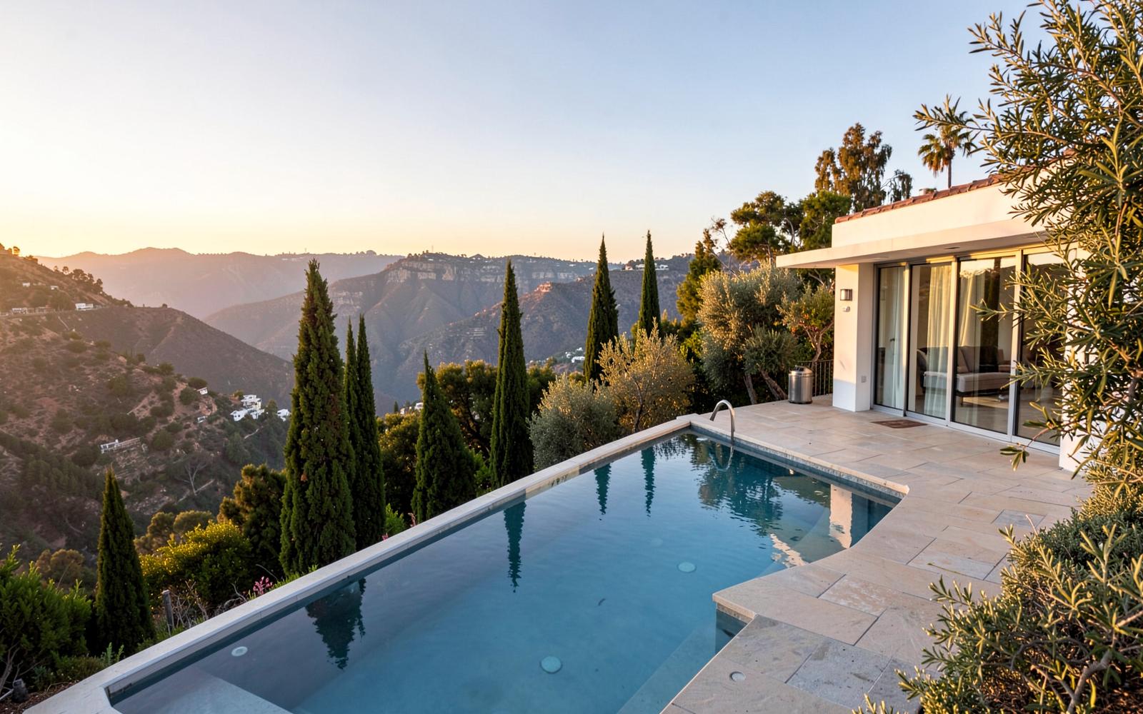Hillside Tarzana property with a vanishing-edge pool above the canyon